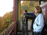 Tour members enjoy an aerial view of Johnstown, Pa., as they ride the town's famous Inclined Plane away from the area hit by the nation's worst flood in 1889, killing more than 2,000 people.  The Inclined Plane began operation in 1891, and was designed to carry people, horses and wagons to the new hilltop community of Westmont. With a 70.9% grade incline, it is the world's steepest vehicular inclined plane.